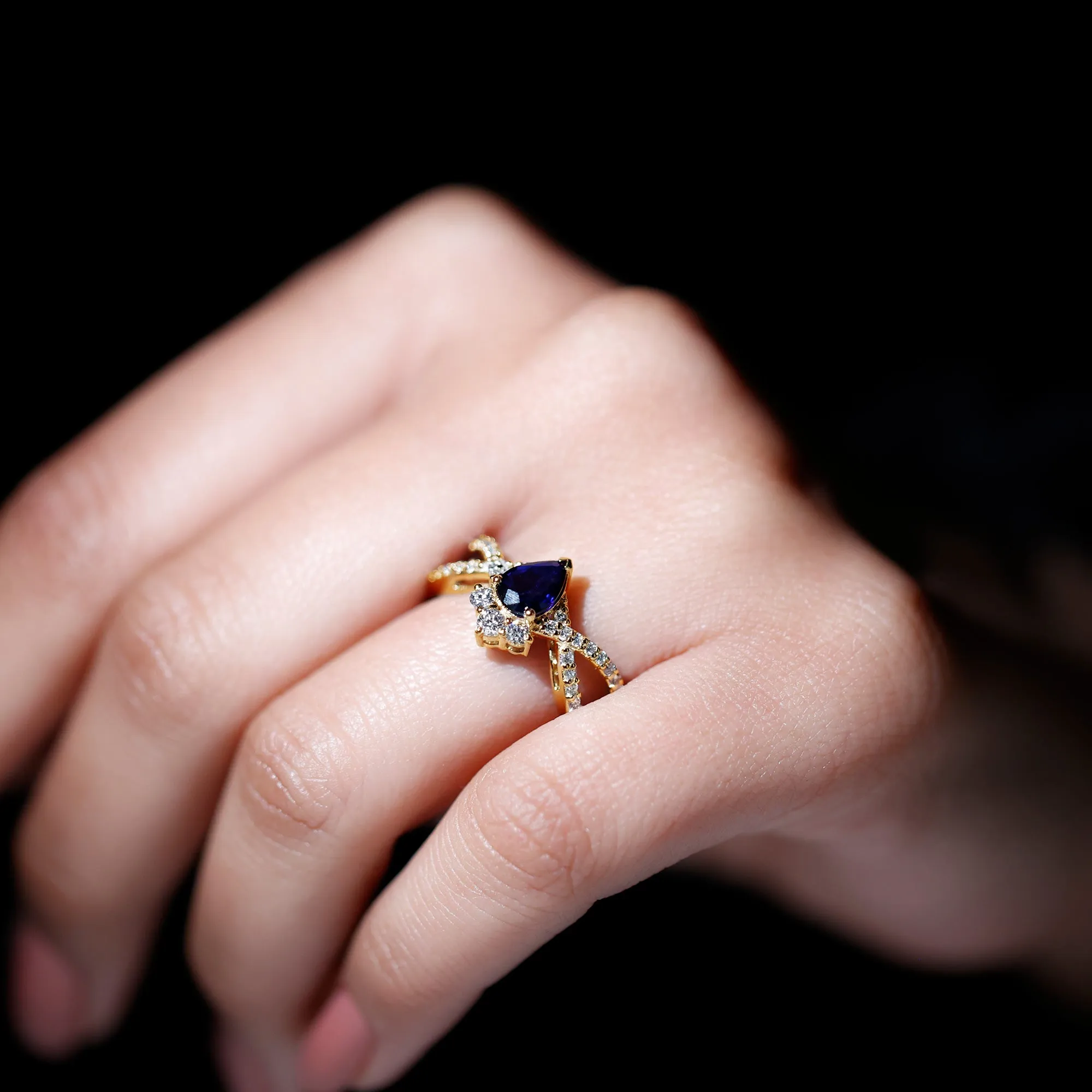 1.75 CT Pear Cut Blue Sapphire and Diamond Crossover Engagement Ring