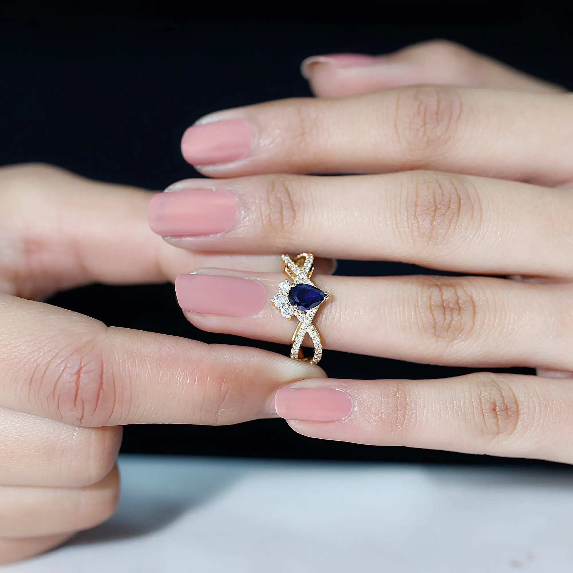 1.75 CT Pear Cut Blue Sapphire and Diamond Crossover Engagement Ring