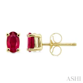 5x3MM Oval Cut Ruby Stud Earrings in 14K Yellow Gold