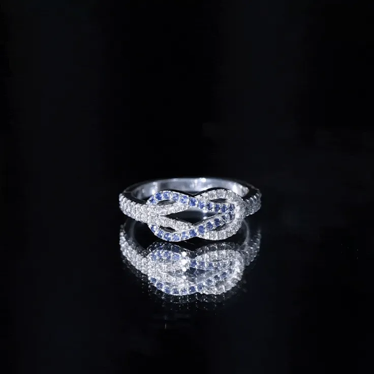 Blue Sapphire And Diamond Interlock Infinity Ring