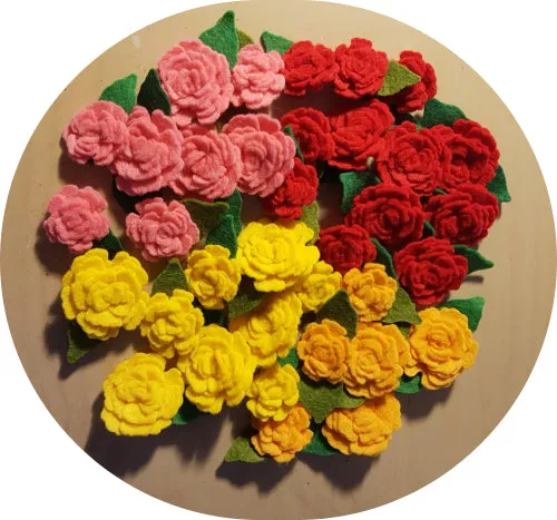 Rose Felt Brooches - by Lucy Jackson